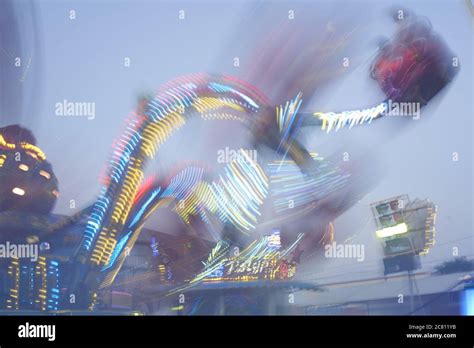 Amusement Park Blurred Effect Abstract Illuminated Background Spinning