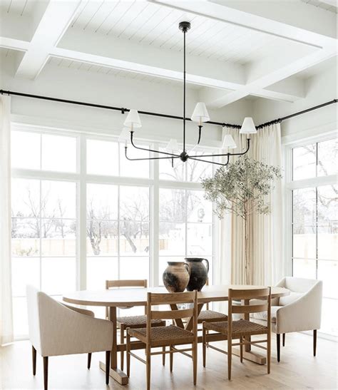 How To Mix And Match Dining Chairs In A Coastal Modern Style