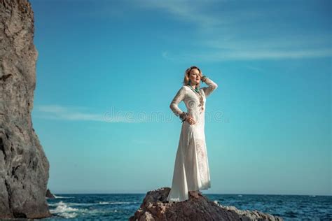 Woman White Dress Sea Stones Rocksmiddle Aged Woman Looks Good With Blond Hair Boho Style In A