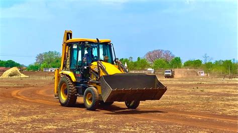 Jcb Backhoe Machine Going To Loading Mud In Tata Truck And Bharat