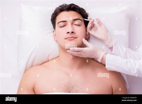 Handsome Man In Spa Massage Concept Stock Photo Alamy