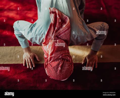 A Muslim praying in a modern mosque during the holy Muslim month of Ramadan Stock Photo - Alamy