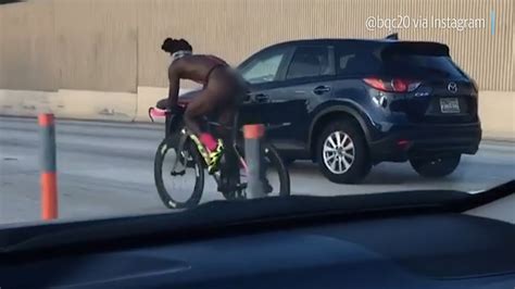 A Naked Biker Rider Left Drivers Stunned As He Peddled His Bike On Busy