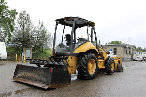 2007 Cat 414e Skip Loader Used 2007 Cat 414e Skip Loader