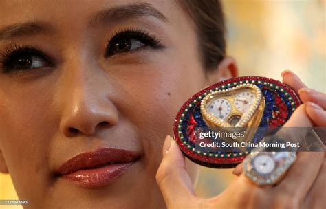 Model Jennifer Tse Ting Ting Shows A Heart Shaped Dual Time Gilt