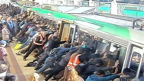 Commuters Push Train To Free Trapped Man Today