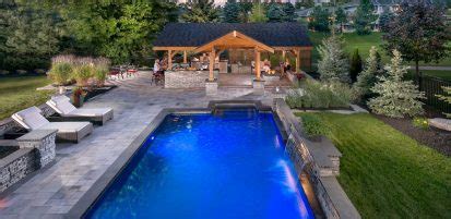 Contemporary Umbriano Pool Deck With Fire Feature Unilock