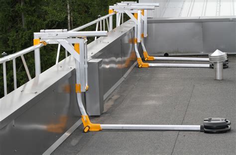 Railing System Provides Temporary Fall Protection - Roofing