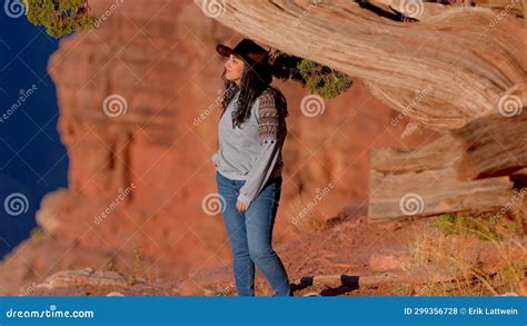 Cowgirl At The Grand Canyon Experiences A Feeling Of Pure Freedom Stock