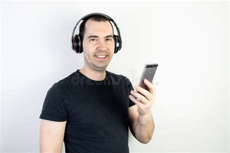 Young Man Male Guy Wearing Headphones Looks Happy Stand Wear Music Good