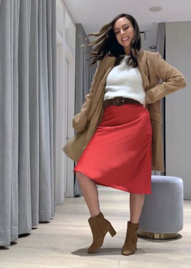 Sydne Style Shows How To Wear A Red Skirt With White Sweater And Camel