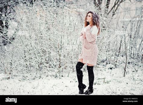 Curly Brunette Girl Background Falling Snow Wear On Warm Knitted Sweater Black Mini Skirt And
