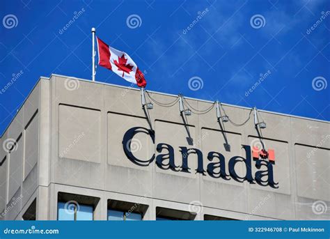 Canadian Flag and Canadian Government Logo at DND Building in Ottawa ...