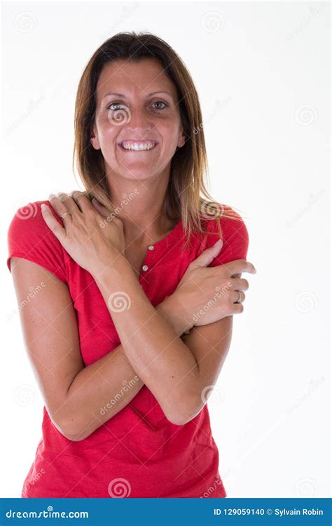 Smiling Brunette Woman With Crossed Arms Looking Stock Photo Image Of Studio Female