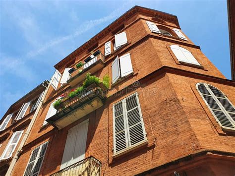 Low Angle View Of A Red Brick House In Toulouse France Stock Image