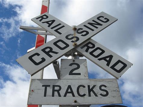 "Railroad Crossing 2 Tracks Sign" by Eric Sanford | Redbubble