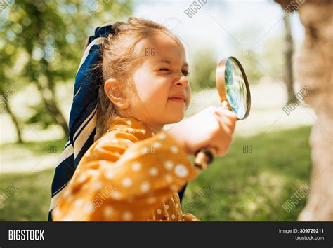 Curious Kid Magnifying Image And Photo Free Trial Bigstock