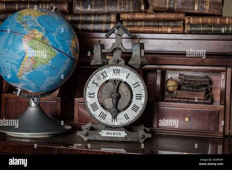 Globe Clock On Books Hi Res Stock Photography And Images Alamy