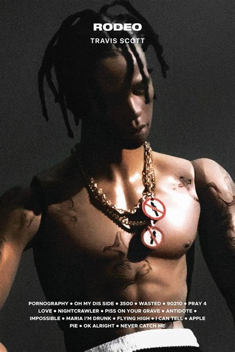 A Man With Dreadlocks And Tattoos On His Chest Is Wearing A Necklace