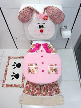 A Toilet With A Pink And White Bunny On It