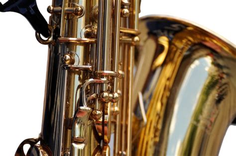 premium photo fragment  saxophone  white background sax close
