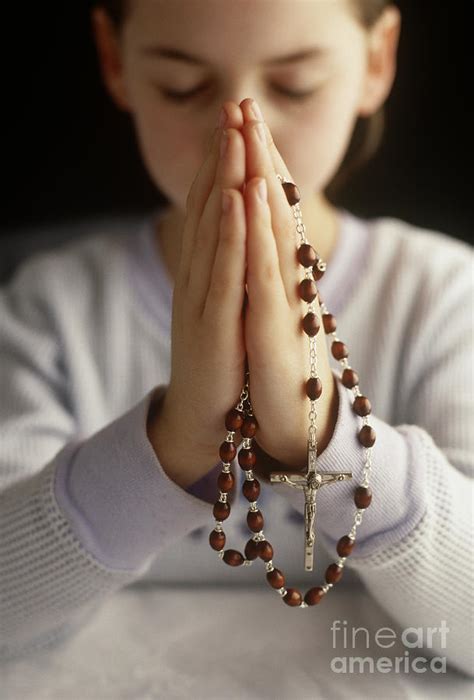 Praying With Rosary Beads Photograph by Jim Corwin - Pixels