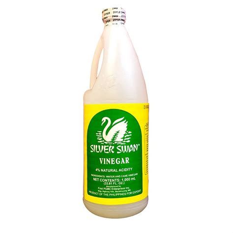 A Gallon Bottle Of Silver Swan Vinegar On A White Background With