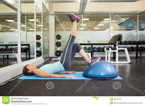 Fit Brunette Using Bosu Ball To Work Out Stock Photo Image Of View