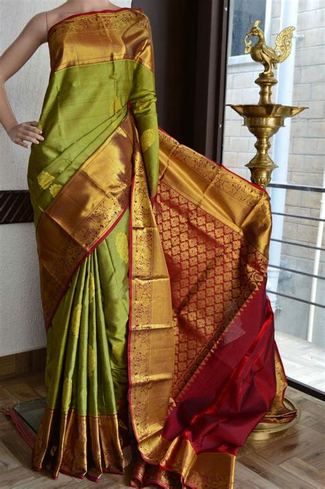 Green Pure Kanchipuram Silk Saree With Meroon Zari Border On Animal