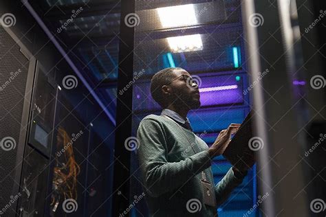 African American Network Engineer In Server Room Stock Image Image Of