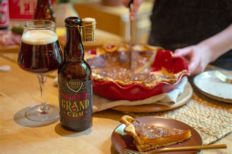 Photography Mad Elf Grand Cru bottle glass on table Tröegs