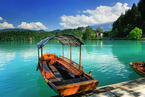 Traditional Pletna Boat On Lake Bled Photograph By Johnathan Ampersand