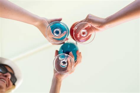 Premium Photo Close Up Of Hands Holding Glass