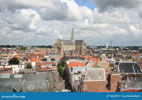 Cathedral of Haarlem stock image. Image of houses, cityscape - 16654013