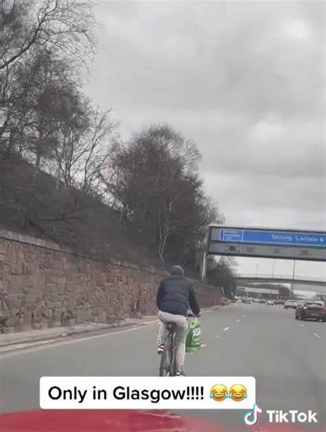 Shocking Moment Cyclist Spotted On Busy Scots Motorway As Stunned Drivers Look On The Scottish Sun