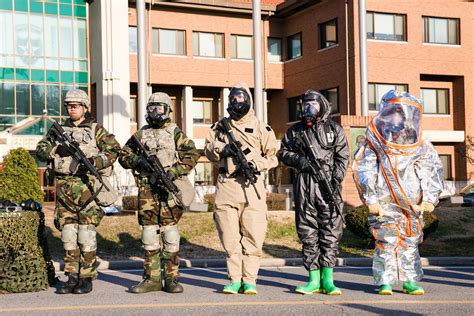 US Army soldiers from the 2nd Infantry Division showcasing CBRN gear ...