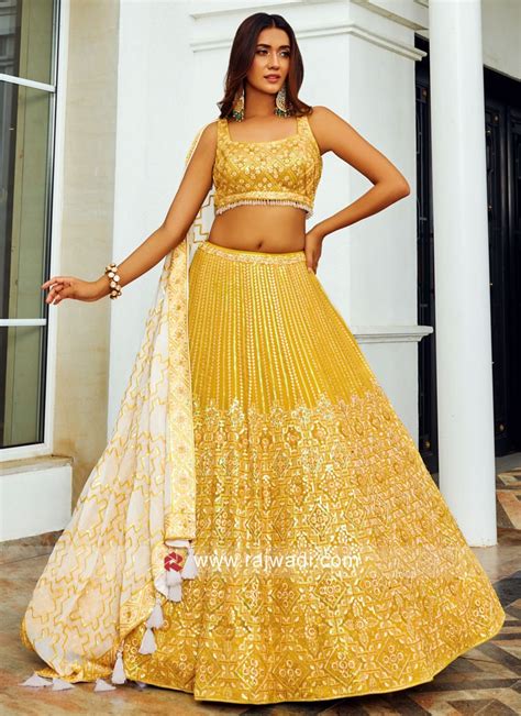 Stunning Yellow Lehenga Choli With Sequins Work