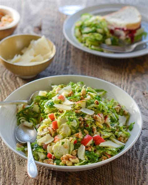 Brussels Sprout Salad With Apples Walnuts And Parmesan