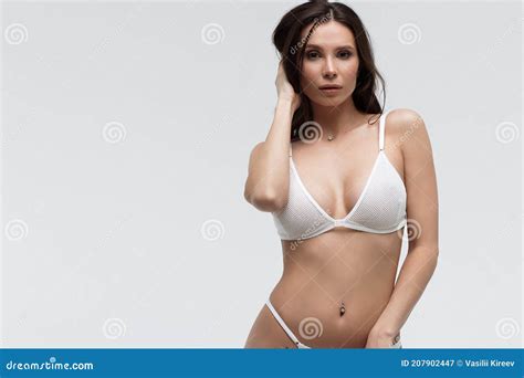 Charming Woman With Figure In White Lingerie Looking At Camera Stock