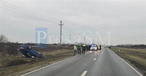 FOTO VIDEO Accident în județul Satu Mare A ajuns cu mașina răsturnată