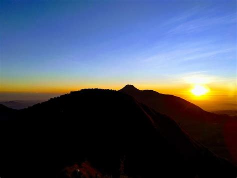 Premium Photo | Landscape of sunrise over mountain peak