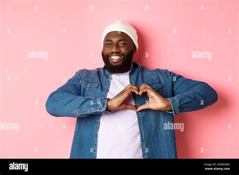 Happy African American Man Showing Heart Sign I Love You Gesture