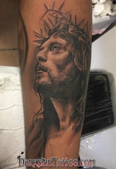 Black Jesus Face Tattoo