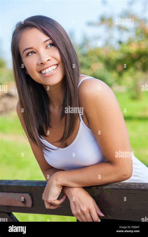 Beautiful Happy Asian Eurasian Young Woman Or Girl Wearing White T