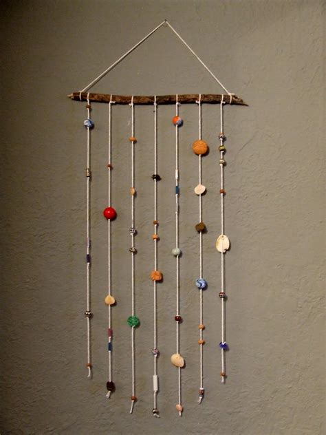 SINNEMOTA: Beaded wall hanging.