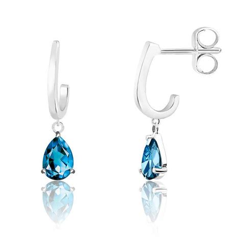 Boucles D Oreilles Pendantes Or Blanc Topaze Blue London Ocarat