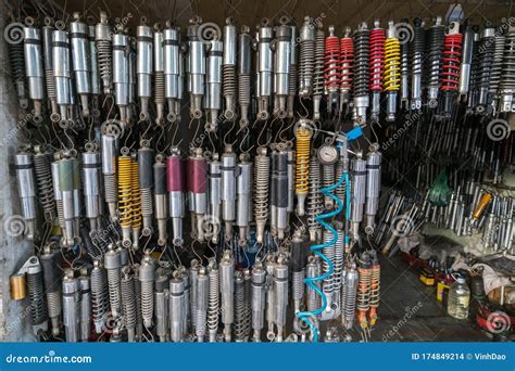 Many Old Shock Absorbers Hanging At A Repair Shop On Hanoi Street