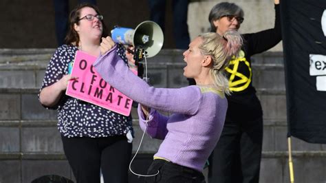 Extinction Rebellion Protester Climbs Melbourne Arts Centre