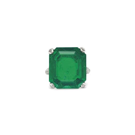 AN EMERALD AND DIAMOND RING, BY CARTIER | Christie's