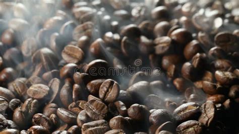 Coffee Beans Roasting In A Home Coffee Roaster With Internal Spiral